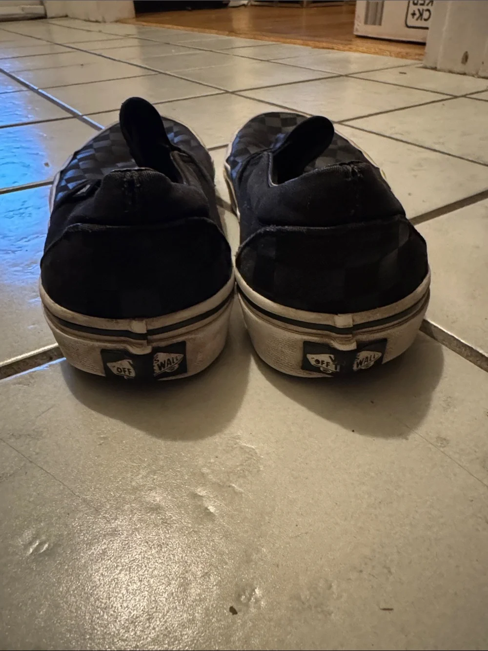 Vans Black Checkerboard Slip-On Sneakers